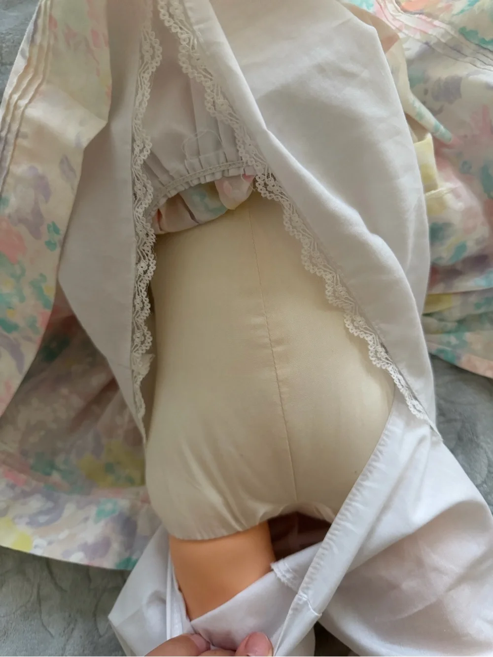 Doll by Pauline Blonde Vinyl Baby Doll with Embroidered Bib